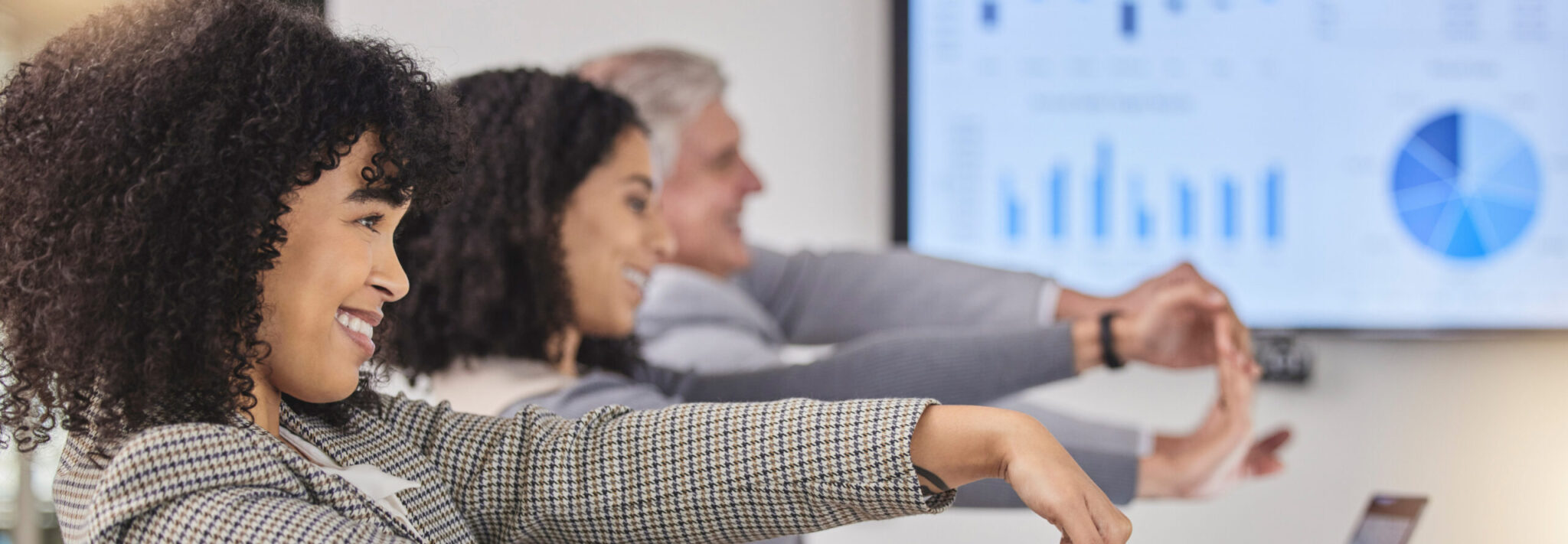Gym trainer leading corporate wellness session